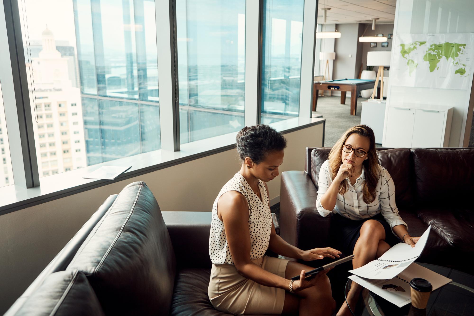 consultant speaking with clients at apartment